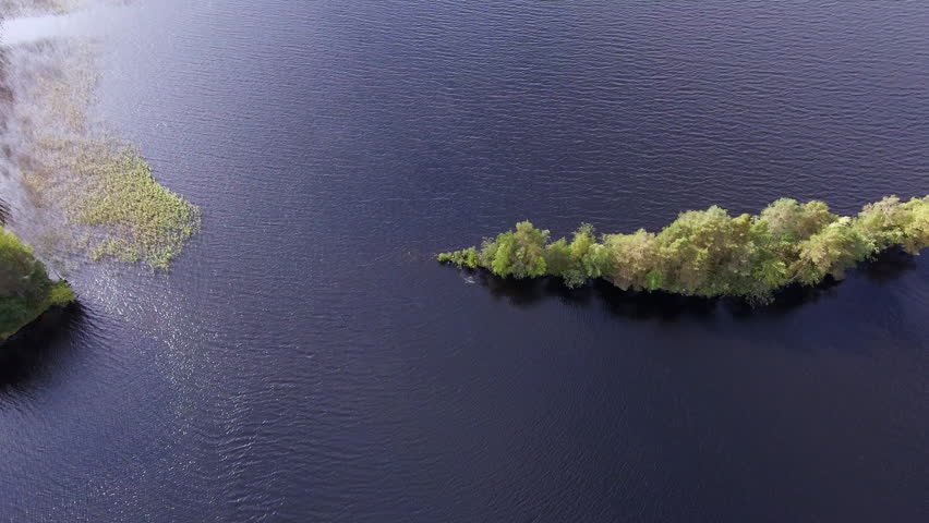 Beautiful small narrow island in a lake in Finland.