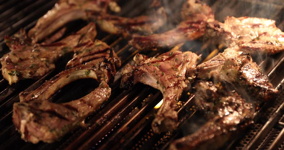 Lamb Chops Cooking on a Hot Blazer Gas Grill Barbecue , BBQ Originally made of Lamb. Roast Lamb Rack On BBQ Grill Royalty-Free Stock Footage #1020372388