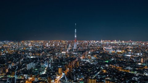 Tokyo Japan 15 Nov 2018 : Aerial night hyper lapse of Tokyo Skytree tower with Tokyo city in background.Tokyo Skytree is a broadcasting, restaurant and observation tower in Sumida Japan.