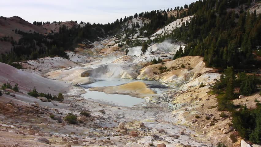 Bumpass Hell Geothermal Field - Malodorous steam escapes from vents and pools in the Bumpass Hell geothermal field. Lassen Volcanic National Park, California, USA