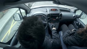 Driving on road with over head view angle HD. Fisheye over head view of driver steering wheel on road. Directly on top of head angle. Ultra-high definition video.