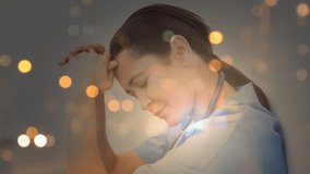 Digital animation of tensed nurse sitting with hand on head. City traffic moving on the street at night  - Powered by Shutterstock - Get 15% off with code: PIKWIZARD15