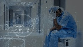 Digital animation of stressed physician sitting in the hospital corridor. Digital computer interface in foreground  - Powered by Shutterstock - Get 15% off with code: PIKWIZARD15