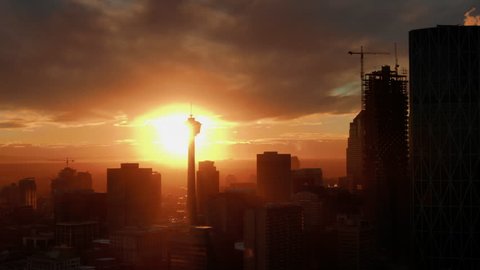 Aerial Drone Shot of Calgary Downtown Skyline at Sunset, Close up on Calgary Tower, Alberta Canada. Oil and Gas city. 
