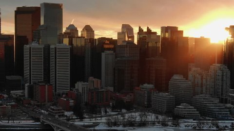 Aerial Drone Shot of City Skyscrapers at Sunset, Calgary Downtown City Skyline, Alberta Canada. Oil and Gas City 
