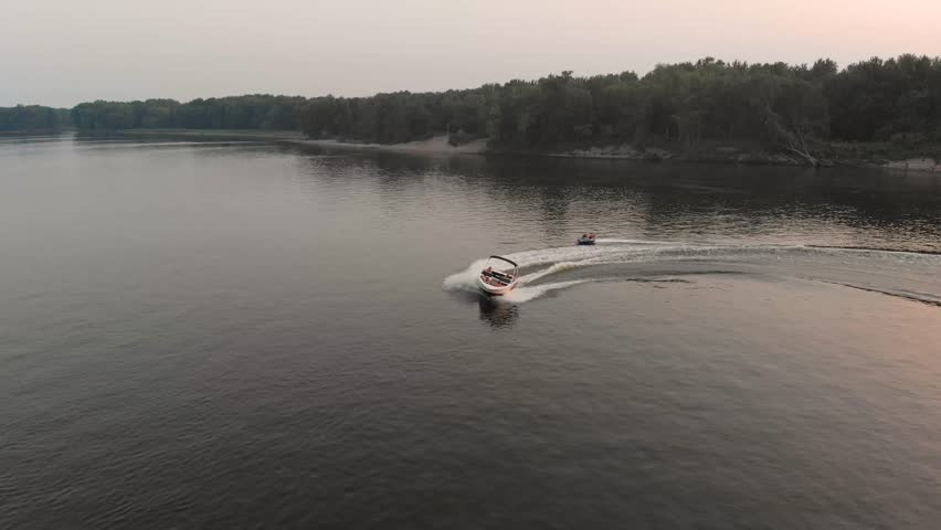 Tubing at sunset on the Mississippi River.