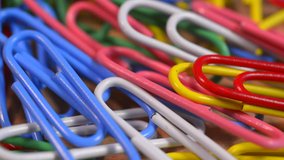 Track over color coated paper clips