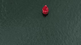 Aerial red water buoy