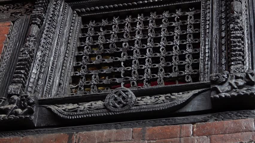 Carved Wooden Elements in Nepalese Traditional Architecture. Authentic Local Building Decor in Nepal