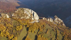 Aerial 4k drone video of autumn landscape. Mountains and forest from above