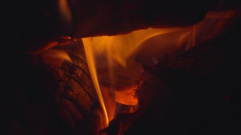 Close up of a burning fireplace. Macro details. Slow motion.