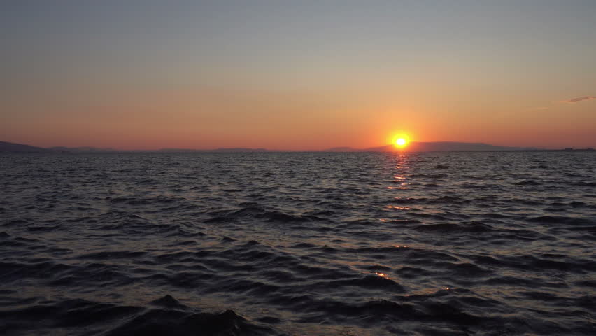 Red Sunset Sparkles on Sea Time Lapse