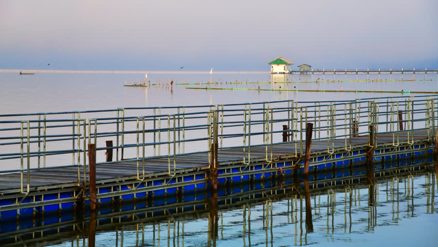 4K time lapse video of walk way with Kwan Phayao lake in the morning, Thailand.