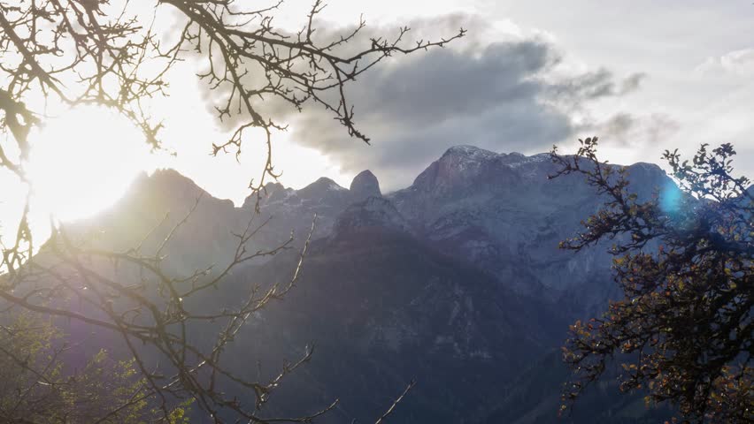 TL timelapse clouds at sunset over the Hochkoenig in Salzburg