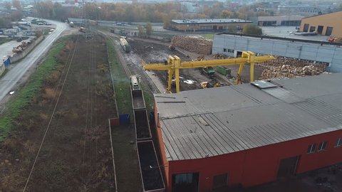 shooting from a drone to a metal processing plant, a train with recycled metal leaves