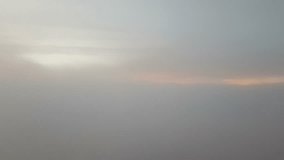 A video clip of flying clouds and sunset during a flight between Delhi-Indore in India.