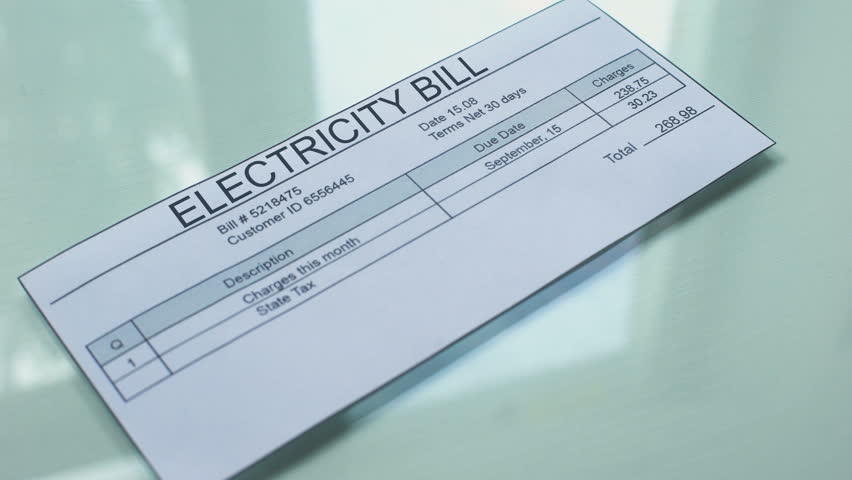 Electricity bill paid, hand stamping seal on document, payment for services Royalty-Free Stock Footage #1020507406