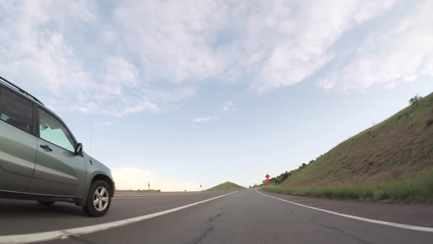 Driving on paved road in Boulder area. | Shutterstock HD Video #1020513946