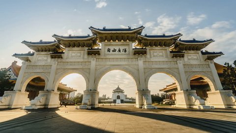 4K Time lapse of front gate of Chiang Kai-shek Memorial Hall at dawn, Taipei, Taiwan. Camera zoom out. Chinese word mean "Liberty Square".