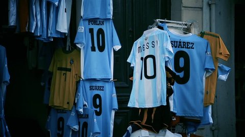 Montevideo, Uruguay - May 2015: Clothes Market Stall with Argentine, Uruguayan and Brazilian National Football Team Jerseys. 