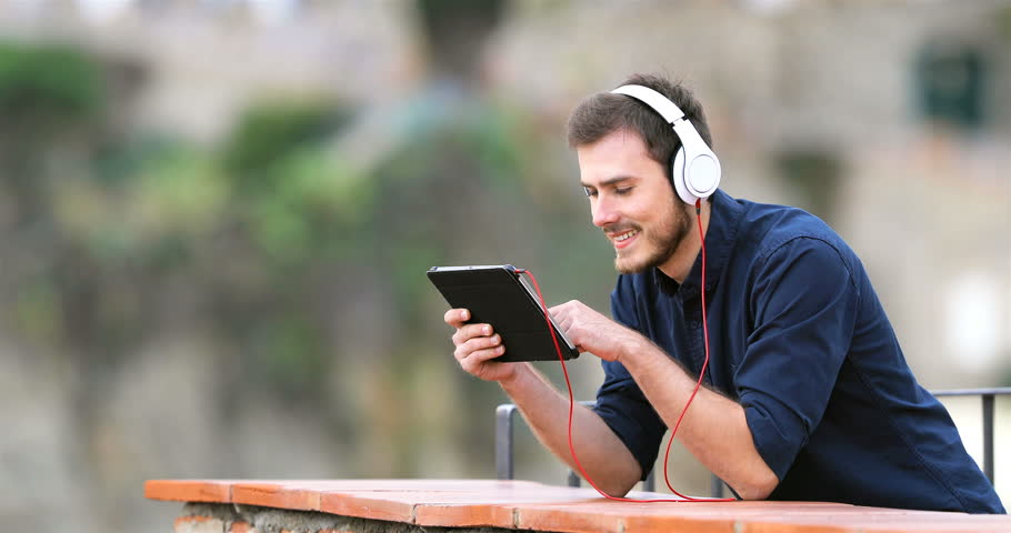 Media listening. Watching and Listening. Planshet for teens.