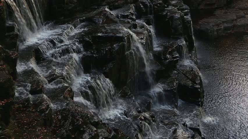 Cascade of The Falls of Clyde on the River Clyde near New Lanark, South Lanarkshire, Scotland.
