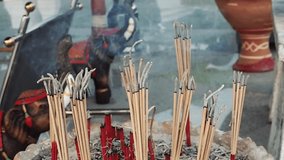  Burning incense sticks with smoke