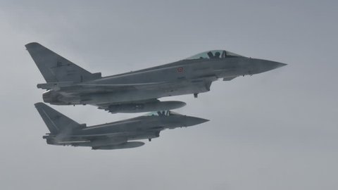 Military Fighter Combat Jet Aircrafts Formation Eurofighter Air to Air in Flight. Mediterranean Sea 9 June 2016