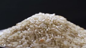 Footage rice falls into a plate. HD video