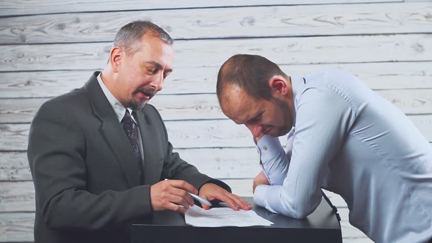Angry mean caucasian boss shouting scolding frustrated incompetent employee for bad work or business failure. Error in the documents. Royalty-Free Stock Footage #1020568990
