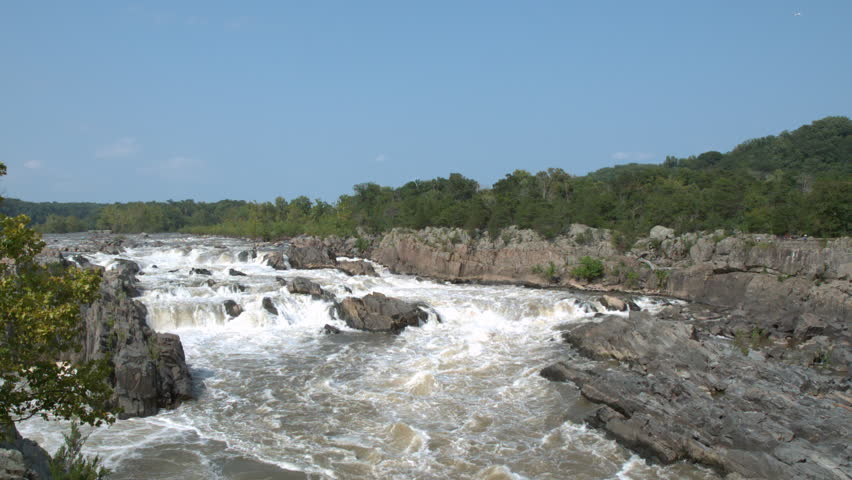 Rapids of Potomac River flowing through Great Falls Maryland slow motion