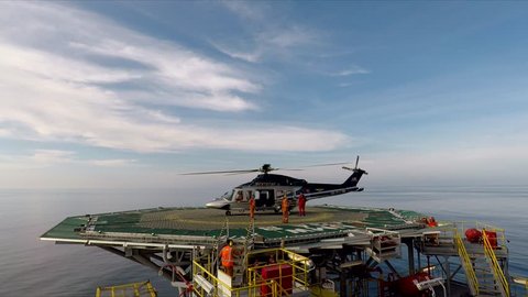 KELANTAN, MALAYSIA - JANUARY 13, 2017: Crew change by helicopter at Velesto NAGA 8 jackup drilling rig, North Malay Basin gas development field.