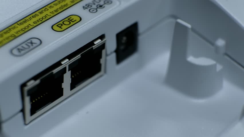 Plugged in network cable on rj45 port with POE label Royalty-Free Stock Footage #1020598579
