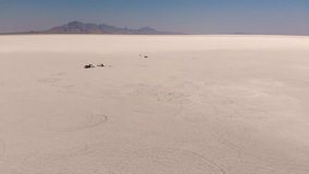 Drone aerial of cars on the Bonneville salt flats