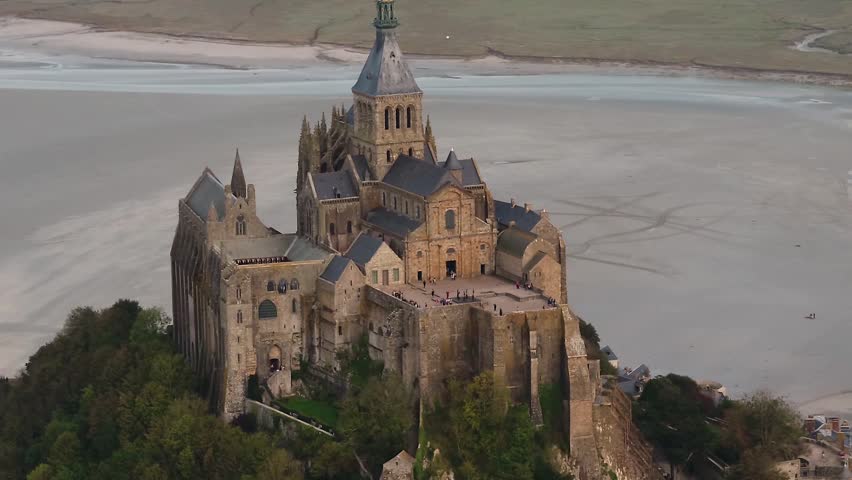 Aerial drone shot of the Mont-Saint-Michel and his bay in Normandy, France. Le Mont-Saint-Michel en France, Normandie, vu d