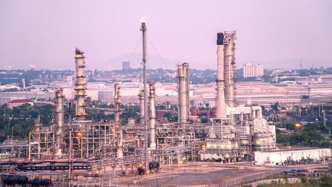 Time-lapse: Petrochemical Industrial. Oil refinery and Oil industry at twilight. 4K