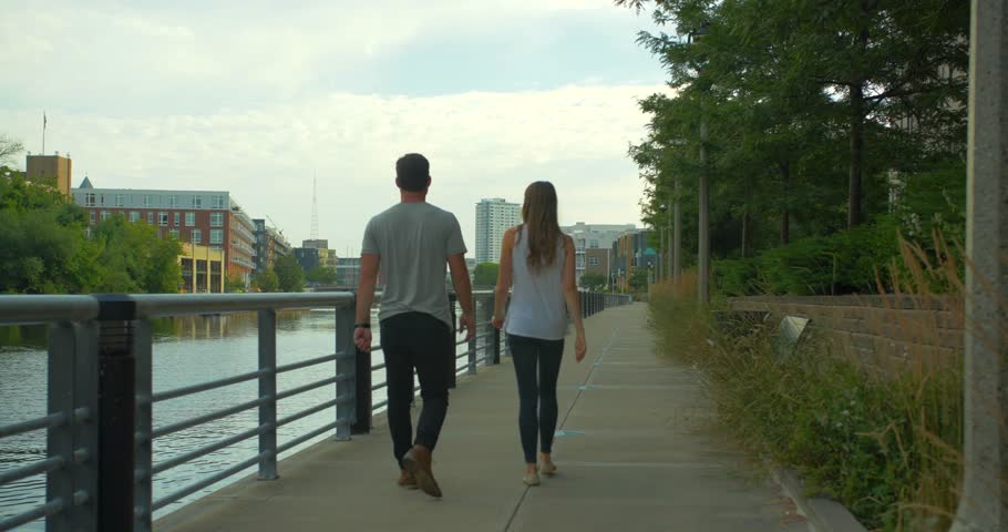 Couple Walks Along the Riverwalk, Closeup