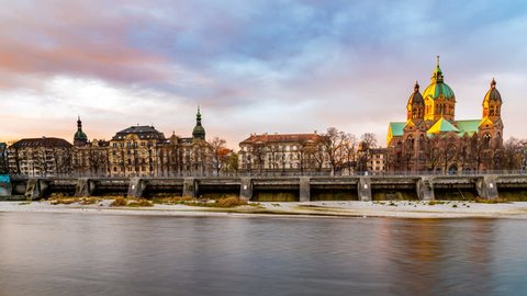 Munich skyline, isar river and Saint Lucas Church is the largest Protestant church in Munich Germany. Sunset over munich city bavaria. Timelapse video