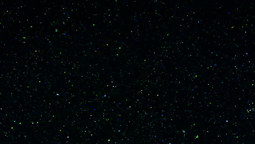 Greenish Glitter slowly moving. Black background. 60fps | Shutterstock HD Video #1020653512
