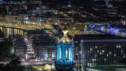 Establishing Aerial View of Stockholm at night, City Hall, Gamla Stan, Sweden