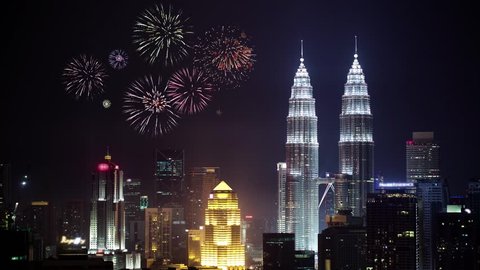 Kuala Lumpur, Malaysia, November 2014 - Fireworks with a night view at KL City, Petronas Twin Tower. HD Resolution. Kuala Lumpur, Malaysia