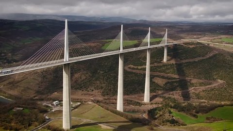 Millau, Tarn/France - 04 12 2017 : Drone shot of the Millau Viaduct in spring, in the valley of the Tarn, southern France. Le viaduc de Millau par drone au printemps.