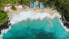Tropical beach with palms, ocean and waves, aerial view of paradise island. Top view