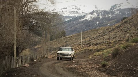 Old Pickup Truck on Dirt Road near the Andes Mountains, Neuquen province, Patagonia, Argentina, South America. 