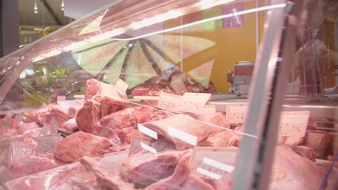Butchery showcase fresh meat on a market Montpellier France