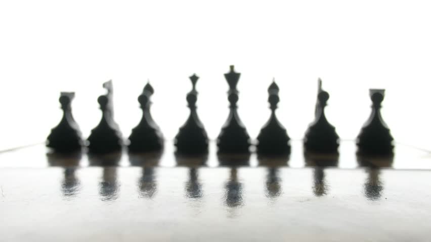Game of chess, the silhouette figures on a white background. 4k uhd. | Shutterstock HD Video #1020687592