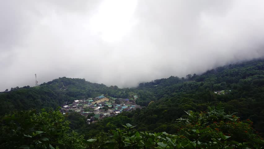 time laps of mist over Hill tribe village