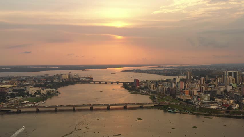 Abidjan Sunset, Ivory Coast, Africa, drone aerial view Royalty-Free Stock Footage #1020709567