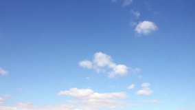 Very nice blue soft sky, white fast moving clouds, time lapse summer sunny weather, Neautiful real colourful season, clean day, horizon, panorama view.