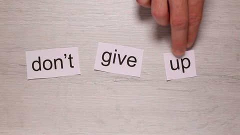 Composition Of Words That Form The Phrase "Don't Give Up"